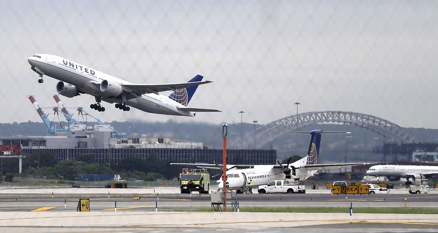 In this July 25, 2013 file photo, a United Airlines plane, top left, takes off from Newark Liberty International Airport, in Newark, N.J.  The three largest U.S. airlines have changed the way they price multi-city trips, forcing those who book such itineraries to pay hundreds of extra dollars in airfare. Most fliers buy simple roundtrip tickets and won’t be affected. But travelers visiting several cities on one trip, especially those flying for business, are seeing airfares six or seven times the normal price.   (AP Photo/Julio Cortez)