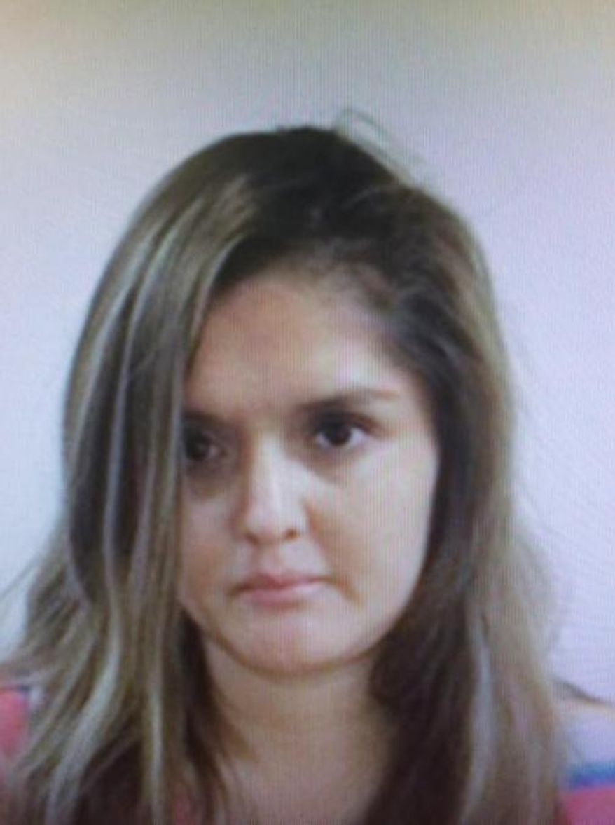 This undated handout photo provided by the FBI shows Brenda Delgado. The Dallas woman accused of arranging for a hit man to kill a dentist who was dating her ex-boyfriend has been added to the FBI's 10 Most Wanted fugitives list Wednesday, April 6, 2016. Delgado is wanted for capital murder and unlawful flight to avoid prosecution. (FBI via AP)