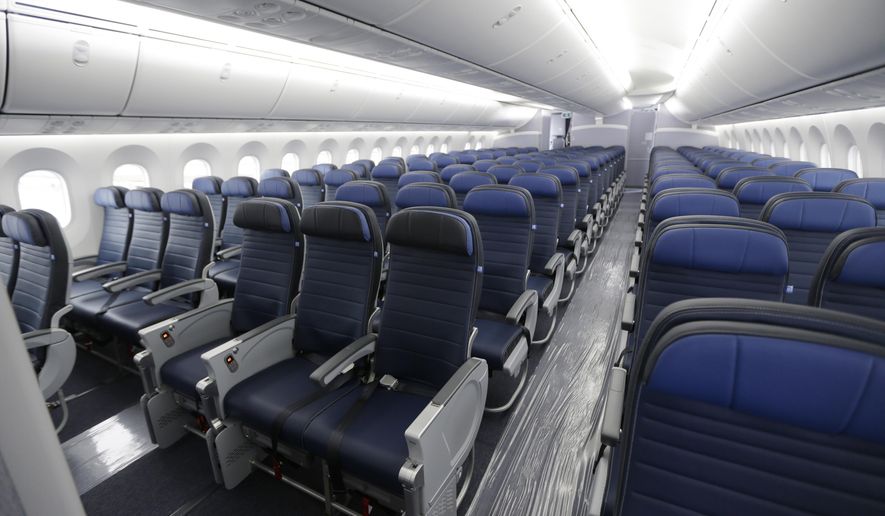FILE - In this Jan. 26, 2016, file photo, economy class seating is shown on a new United Airlines Boeing 787-9 undergoing final configuration and maintenance work at Seattle-Tacoma International Airport in Seattle. The Senate refused April 7 to come to the aid of airline passengers squeezed by the ever-shrinking size of their seats. An amendment by Sen. Chuck Schumer, D-N.Y., would have blocked airlines from further reducing the "size, width, padding, and pitch" of seats, passengers' legroom and the width of aisles. (AP Photo/Ted S. Warren, File)