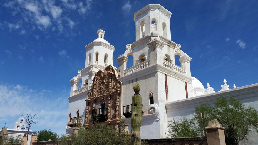 FILE - This May 6, 2015 file photo shows the Mission San Xavier del Bac just south of Tucson, Ariz. Church officials discovered extensive graffiti on the church early, Thursday, April 7, 2016. (AP Photo/Astrid Galvan, File)
