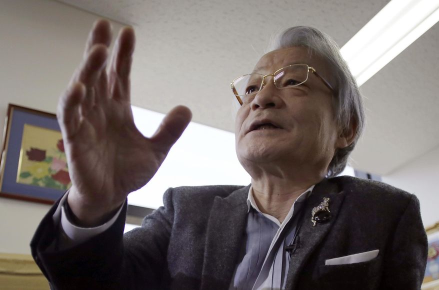 In this March 22, 2016 photo, lawyer Hiroyuki Kawai answers questions during an exclusive interview with The Associated Press at his office in Tokyo. Kawai is representing dozens of courtroom battles to shut down Japan’s reactors - a fight he has headed for two decades and one that’s gaining momentum after the multiple meltdowns in Fukushima five years ago. He is also a key figure in an organization set up in March to support the people of Fukushima whose children have developed thyroid cancer since the 2011 disaster. (AP Photo/Eugene Hoshiko)