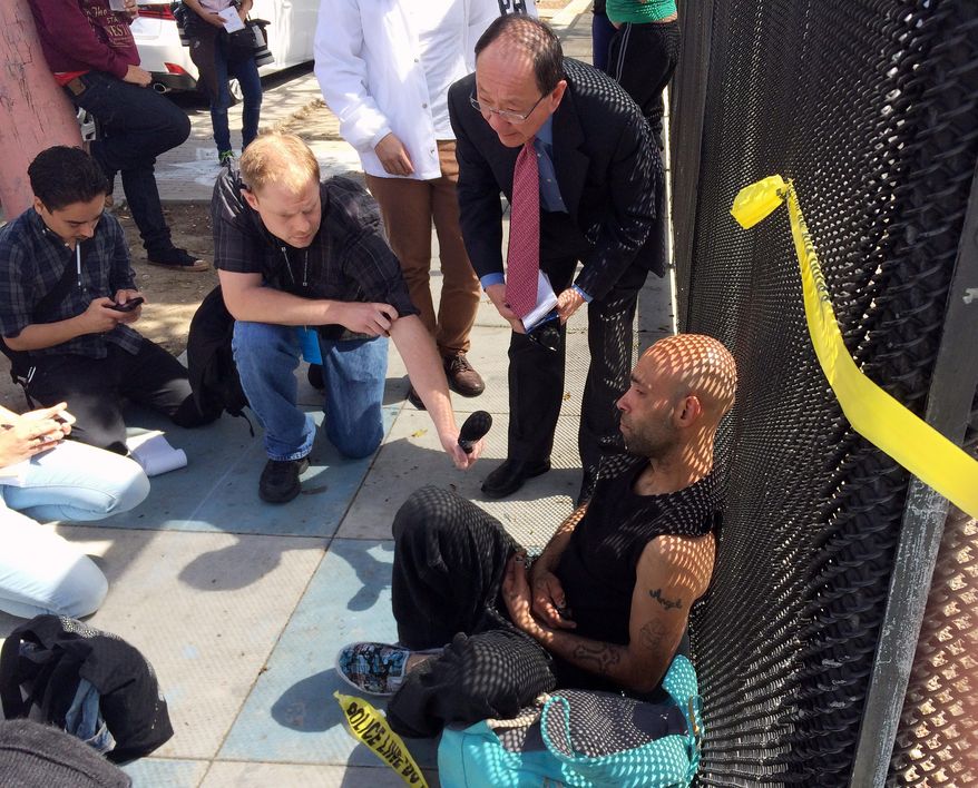 John Visor is interviewed by members of the media in San Francisco, Thursday, April 7. 2016. Visor says he witnessed the fatal shooting by San Francisco Police of an unidentified Latino man carrying a knife. He explained that he lived in the same homeless tent encampment and considered him a friend. (AP Photo/Paul Elias)