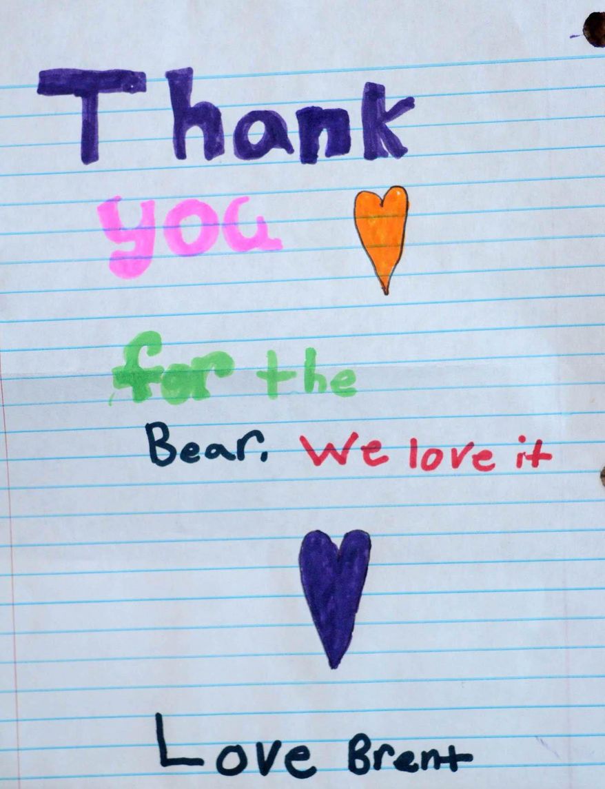 ADVANCE FOR THE WEEKEND OF APRIL 9-10 AND THEREAFTER - In a March 4, 2016 photo, Patty Bidlake shows letters she has received from family members in appreciation of her memory bears, at her home in Wilmington, N.C. Bidlake makes the bears from the clothing of loved one's who've died. (Matt Born/StarNews via AP)