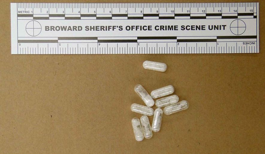 FILE - This Feb. 12, 2015, file photo made available by the Broward Sheriff's Office, Fla., shows confiscated vials of flakka. A synthetic drug that ravaged South Florida a year ago has disappeared as quickly as it arrived. Broward County became infamous a year ago as the epicenter for flakka, a synthetic street amphetamine that caused psychotic outbursts. (AP Photo/Broward Sheriff's Office via AP, File)