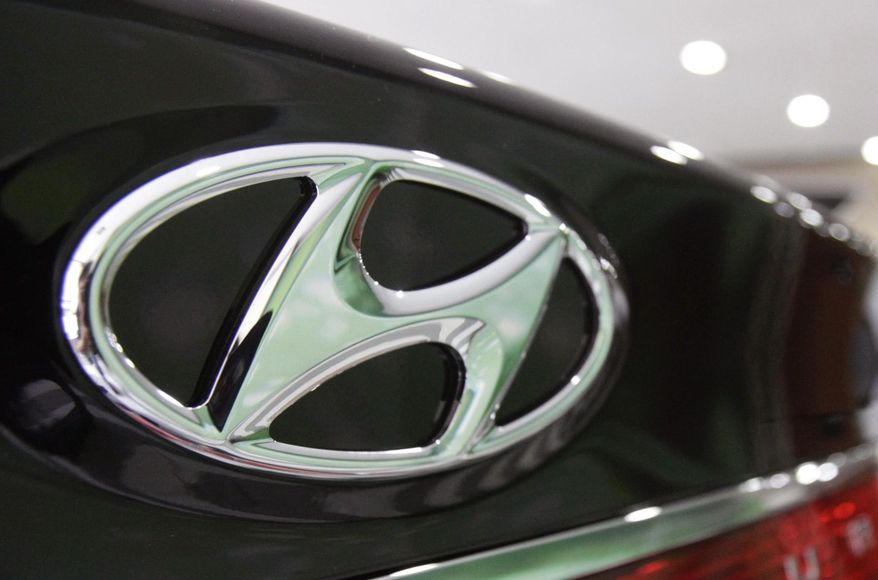 FILE - In this July 26, 2012 file photo, the logo of Hyundai Motor Co. is seen on its car at the company's showroom in Seoul. Hyundai is recalling 173,000 Sonata midsize cars in the U.S., on April 8, 2016, because the power steering can fail, making them harder to steer and increasing the risk of a crash. The recall covers Sonatas from the 2011 model year when the car was Hyundai’s top-selling U.S. vehicle. (AP Photo/Ahn Young-joon, File)