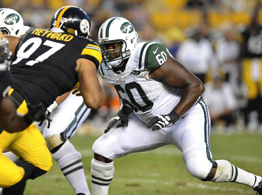 FILE - In this Sept. 16, 2012, file photo, New York Jets tackle D'Brickashaw Ferguson (60) looks to block Pittsburgh Steelers defensive end Cameron Heyward (97) during the fourth quarter of an NFL football game, in Pittsburgh. Ferguson is walking away from football after 10 years of protecting New York Jets quarterbacks. The remarkably durable and consistent left tackle who never missed a snap due to injury has decided to retire, according to a person familiar with the decision.(AP Photo/Don Wright, File)