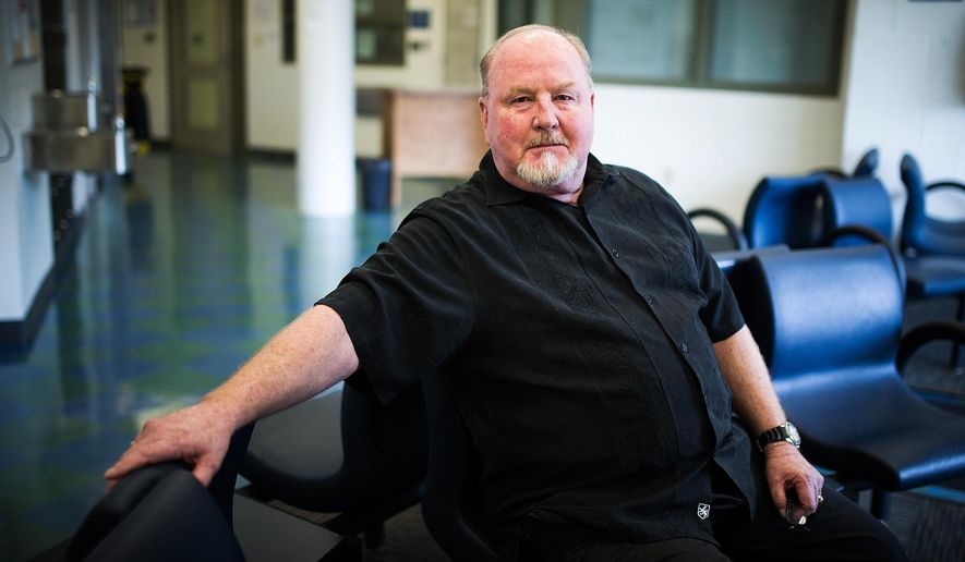 in this March 24, 2016 photo, after working as a pastor, Steve Strickler now focuses his attention on volunteering as a chaplain at Denney Juvenile Justice Center in Everett, Wash. The Daily Herald reports the volunteer chaplain says the goal isn’t to try scaring kids straight, but to talk about good decisions and brainstorm next steps. (Ian Terry/The Herald via AP) MANDATORY CREDIT