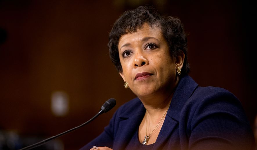 Attorney General Loretta Lynch told the Senate Judiciary Committee that her department has discussed pursuing civil charges against the &quot;climate denial scheme,&quot; as Sen. Sheldon Whitehouse, Rhode Island Democrat, put it. (Associated Press)