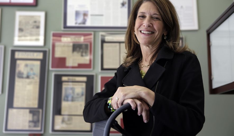 In this Friday, April 8, 2016 photo, Lisa Baron, founder of Memory Care Home Solutions, poses for a photo in her office in St. Louis. The nonprofit is working to help Alzheimer&#x27;s sufferers stay in their homes longer, and the Baron believes her program is a model that should be emulated nationwide. (AP Photo/Jeff Roberson)