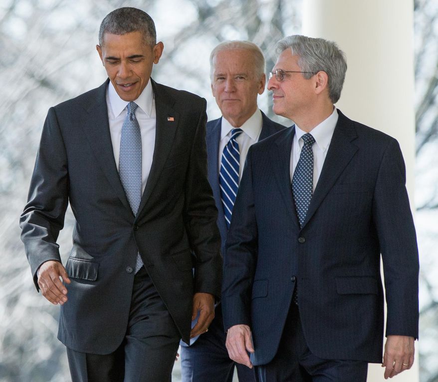 FILE - In this photo taken March 16, 2016, Federal appeals court judge Merrick Garland arrives with President Barack Obama and Vice President Joe Biden to be introduced as Obama’s nominee for the Supreme Court, during an announcement in the Rose Garden of the White House, in Washington. Garland, has been characterized as a moderate who, if confirmed, would nudge his divided colleagues slightly to the left because he would replace conservative stalwart Antonin Scalia. (AP Photo/Andrew Harnik, File)