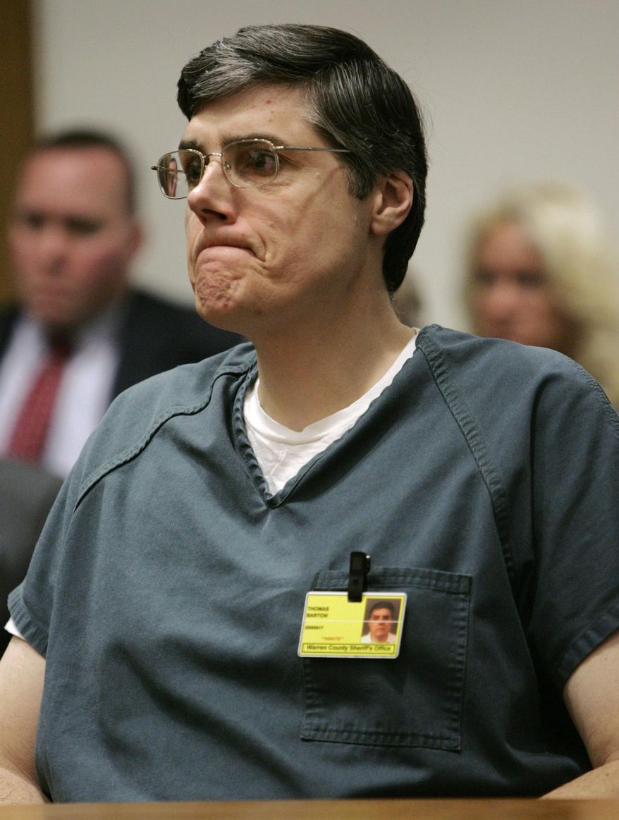 FILE - This Friday March 18, 2005 file photo shows former Springboro Police Lt. Thomas "Jim" Barton listening as he is given the maximum sentence in the shooting death of his wife in Warren County Court in Lebanon, Ohio. The attorney for Barton, a former police official wants a judge to set bail for him in southwest Ohio after a federal court threw out his 2005 conviction on charges from his wife's slaying in a botched burglary. (AP Photo/Al Behrman, File)