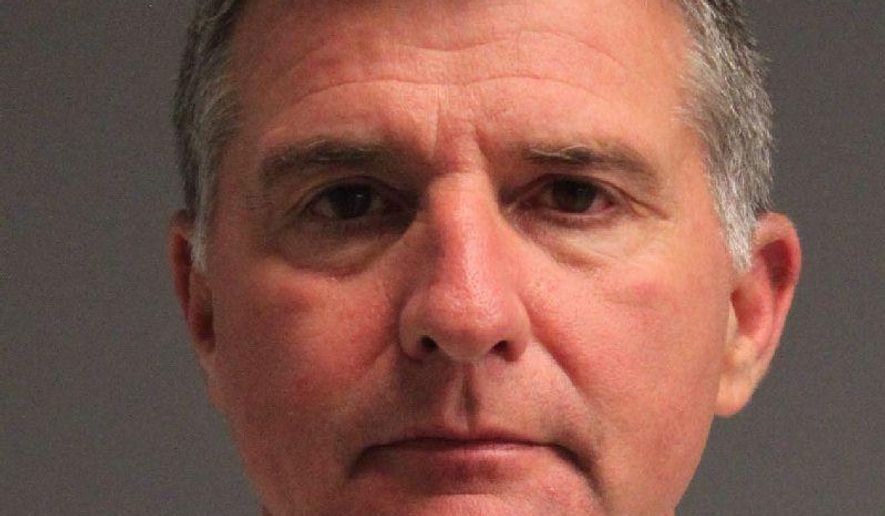 This undated photo provided by Anne Arundel County, Md., shows Ronald Bateman. Authorities say the Anne Arundel County's sheriff has been arrested following a domestic dispute. He was taken into custody Sunday, April 10, 2016. (Anne Arundel County via AP)