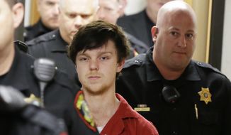 In this Feb. 19, 2016, file photo, Ethan Couch is led by sheriff deputies after a juvenile court for a hearing in Fort Worth, Texas. (AP Photo/LM Otero, File)