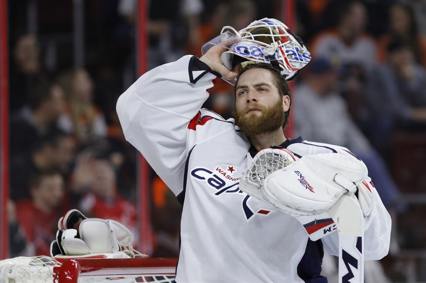 Washington Capitals' Braden Holtby in action during an NHL hockey game against the Philadelphia Flyers, Wednesday, March 30, 2016, in Philadelphia. (AP Photo/Matt Slocum)