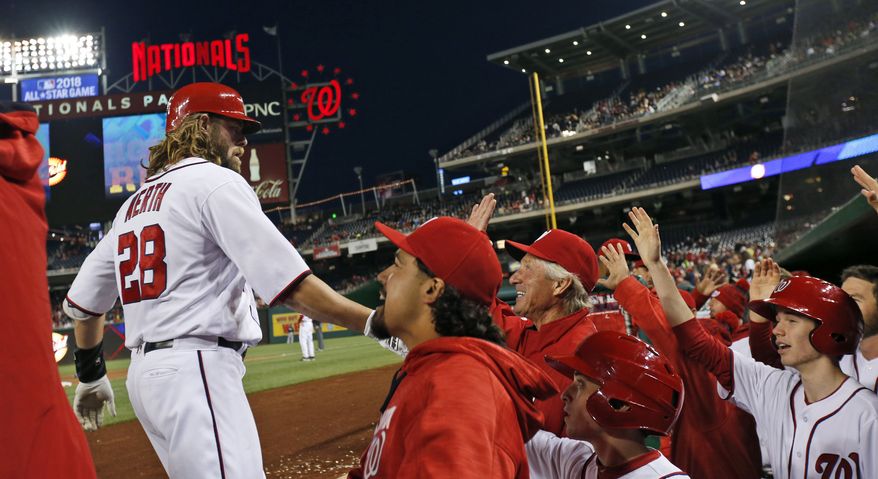 Washington Nationals&#39; Jayson Werth (28) celebrates his two-run homer with his teammates during the fourth inning of a baseball game against the Atlanta Braves at Nationals Park, Wednesday, April 13, 2016, in Washington. (AP Photo/Alex Brandon)