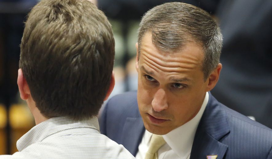 Donald Trump&#39;s campaign manager, Corey Lewandowski, talks to a member of the media at Nathan Hale High School in West Allis, Wisconsin, on April 3. (Associated Press) ** FILE **