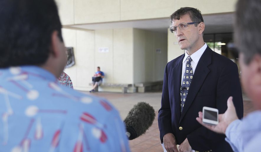 Attorney Mark Gallagher speaks at a news conference about three lawsuits he recently filed accusing Catholic priests in the Diocese of Honolulu of sexual abuse outside of Hawaii's First Circuit Court, Wednesday, April 13, 2016, in Honolulu. The three suits allege the priests abused children and teens throughout the 1950s and 1960s. (AP Photo/Marina Riker)