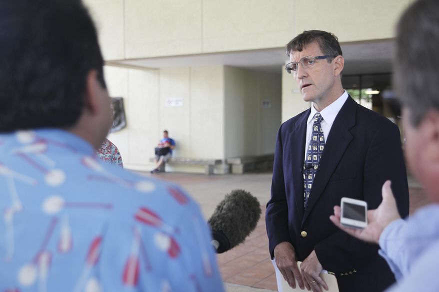 Attorney Mark Gallagher speaks at a news conference about three lawsuits he recently filed accusing Catholic priests in the Diocese of Honolulu of sexual abuse outside of Hawaii's First Circuit Court, Wednesday, April 13, 2016, in Honolulu. The three suits allege the priests abused children and teens throughout the 1950s and 1960s. (AP Photo/Marina Riker)