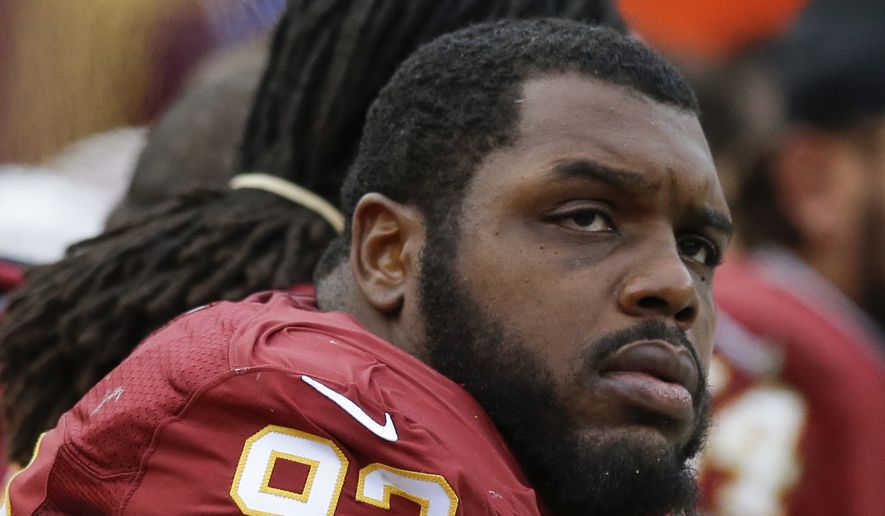 Washington Redskins defensive end Chris Baker (92) watches the action from the bench during the second half of an NFL football game against the Buffalo Bills in Landover, Md., Sunday, Dec. 20, 2015. (AP Photo/Jacquelyn Martin) **FILE**