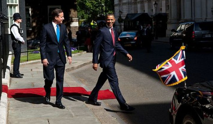 President Barack Obama and British Prime Minister David Cameron depart 10 Downing Street on their way to meet with students at Globe Academy in London, England, May 24, 2011. (Official White House Photo by Pete Souza.)