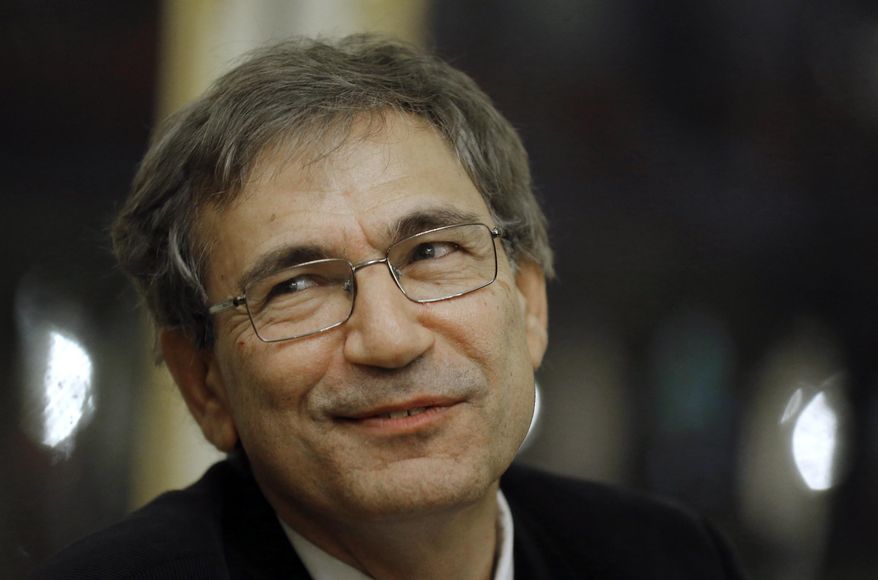 FILE - In this Monday, Oct. 29 2012 file photo, Orhan Pamuk, Turkish novelist and a Nobel Laureate, is seen at the French culture ministry in Paris. Elusive Italian author Elena Ferrante and Turkish Nobel laureate Orhan Pamuk are among six finalists for the 2016 Man Booker International Prize for fiction. Ferrante's Neapolitan tale "The Story of the Lost Child" and Pamuk's Istanbul-set "A Strangeness in My Mind" are on a shortlist, announced Thursday, that includes books from Asia, Africa and Europe. Pamuk is one of Turkey's best-known authors and won the Nobel Prize for literature in 2006. Ferrante has topped best-seller lists around the world with her four novels of friendship and life in Naples, but her identity remains a mystery. She writes under a pseudonym and rarely gives interviews. (AP Photo/Jacquues Brinon, file)
