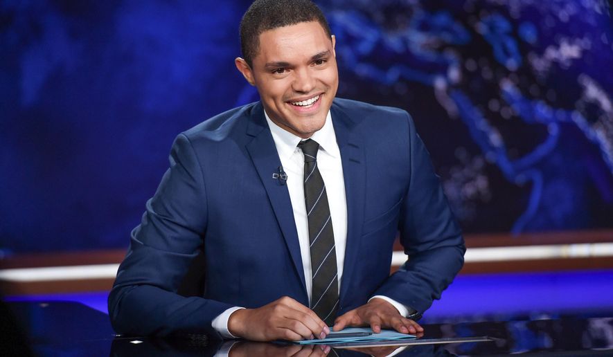 FILE - In this Sept. 29, 2015 file photo, Trevor Noah appears on set during a taping of "The Daily Show with Trevor Noah" in New York. Host Noah and comedians Lewis Black and Brian Regan will be the headliners at the Lucille Ball Comedy Festival in August 2016. The annual festival takes place in Lucille Ball’s hometown of Jamestown each year. (Photo by Evan Agostini/Invision/AP, File)