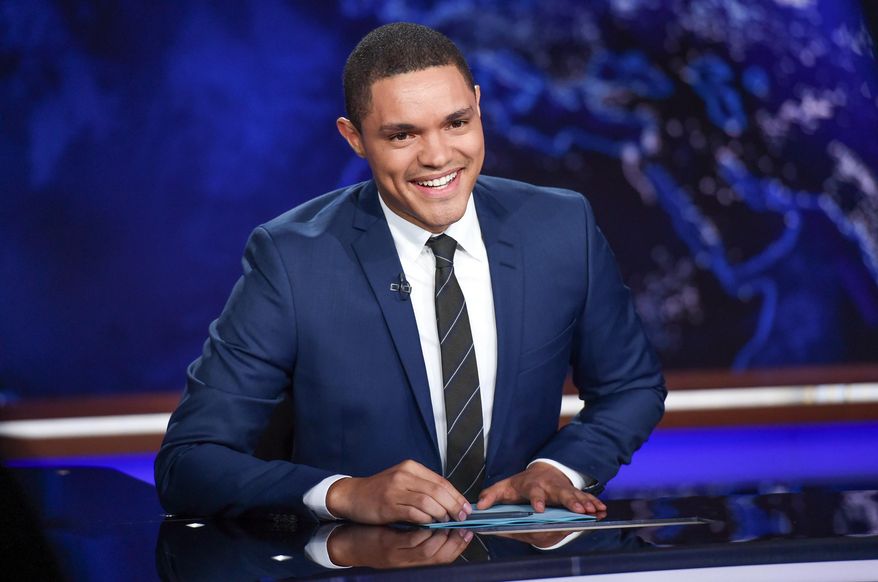 FILE - In this Sept. 29, 2015 file photo, Trevor Noah appears on set during a taping of "The Daily Show with Trevor Noah" in New York. Host Noah and comedians Lewis Black and Brian Regan will be the headliners at the Lucille Ball Comedy Festival in August 2016. The annual festival takes place in Lucille Ball’s hometown of Jamestown each year. (Photo by Evan Agostini/Invision/AP, File)