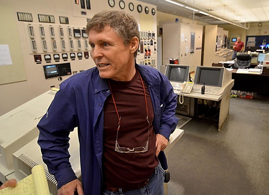 In this photo taken Tuesday April 12, 2016, Duke Energy Wabash River Generating Station employee Bud Bays talks about some of the unique things he has seen during his 36 years while speaking at the station's control room at the plant north of Terre Haute, Ind. After 63 years, Duke Energy's Wabash River Generating Station has ceased to produce power. The station's last official day to burn coal is Friday, April 14, 2016, but power producing units on Tuesday were already shut down. (Joseph C. Garza/The Tribune-Star via AP) MANDATORY CREDIT