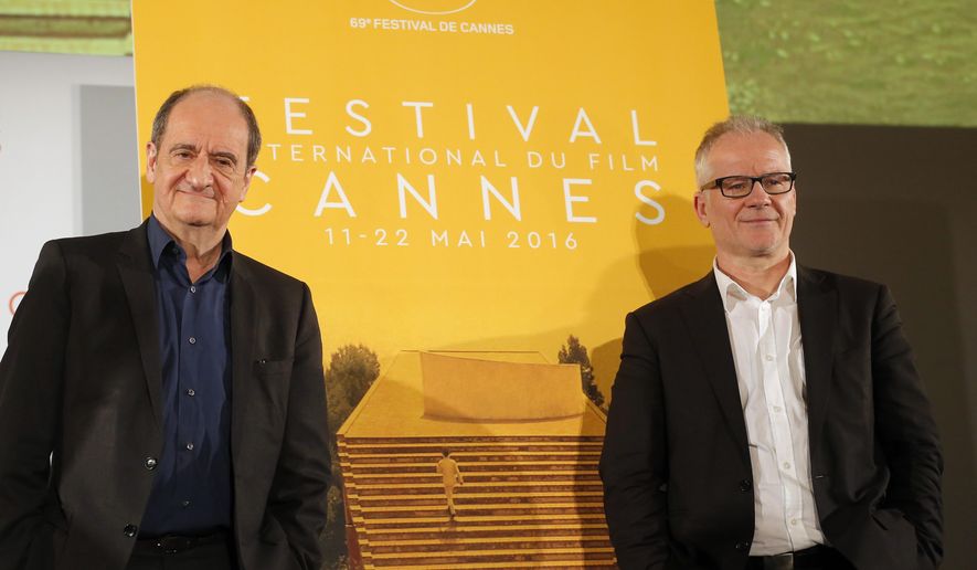 General Delegate of the Cannes Film Festival Thierry Fremaux and Cannes Film Festival President Pierre Lescure pose during a press conference for the presentation of the 69th Cannes film festival, in Paris, France, Thursday, April 14, 2016. A Sean Penn film about aid workers in Africa and movies about interracial marriage and cannibal fashion models are among the selections for this year’s Cannes Film Festival. The 20 films from 28 countries announced Thursday will compete for prestigious Palme d’Or at the May 11-22 festival on the French Riviera, being held under extra security after last year’s attacks on France. (AP Photo/Francois Mori)