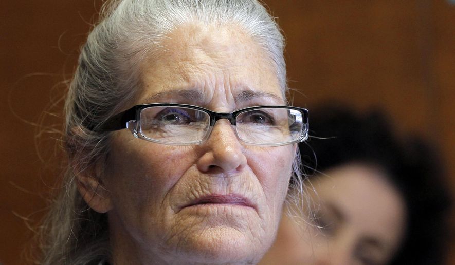 FILE- In this June 5, 2013, file photo, Leslie Van Houten appears during her parole hearing at the California Institution for Women in Chino, Calif. The youngest of Charles Manson’s followers to take part in one of the nation’s most notorious killings is trying again for parole. Van Houten is scheduled for her 21st hearing before a parole board panel Thursday, April 14, 2016, at a women’s prison in Corona, Calif. (AP Photo/Nick Ut, File)