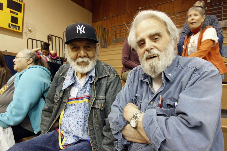 This 2013 photo provided by the Great Bear Foundation shows Chuck Jonkel, right, and Salish poet Vic Charlo in Missoula, Mont. Pioneering bear researcher and advocate Charles "Chuck" Jonkel died Tuesday, Aprill 12, 2016, of natural causes at a Missoula, Mont., nursing home, his son Jamie Jonkel said. He was 85. Jonkel led the Border Grizzly Project shortly after the bears were placed under the protection of the Endangered Species Act in 1975. (Frank Tyro/Great Bear Foundation via AP)