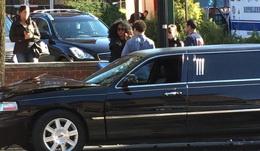 This photo provided by PBS39 WLVT, singer Diana Ross stands by her limousine that was involved in an accident on Wednesday, April 13, 2016 in Bethlehem, Pa. Bethlehem police say the 72-year-old singer complained of head and neck pain after the crash on Wednesday afternoon. She was treated at the scene by paramedics and indicated she would seek further treatment on her own. (Brittany Garzillo /PBS WLVT via AP)
