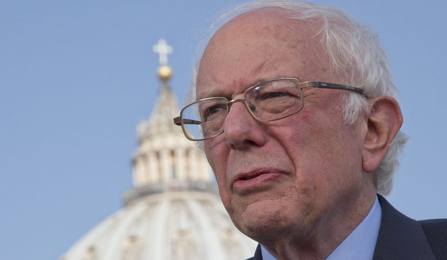 Democratic presidential candidate Bernard Sanders, backdropped by the dome of St. Peter&#x27;s Basilica at the Vatican, said he told Pope Francis that he appreciated the message that he is sending the world about the need to inject morality and justice into the world economy. (Associated Press)
