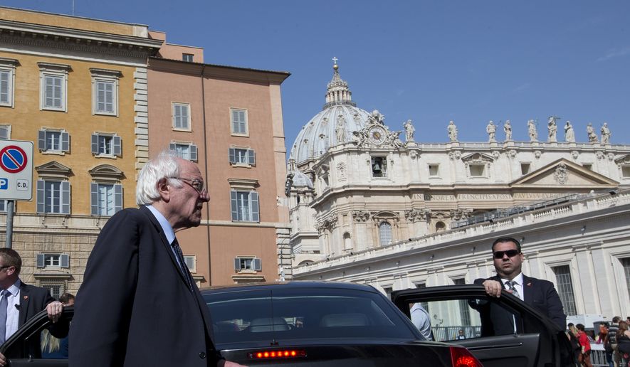 U.S. presidential candidate Bernie Sanders, backdropped by St. Peter's Basilica, leaves after an interview with The Associated Press, at the Vatican Saturday, April 16, 2016. (AP Photo/Alessandra Tarantino)