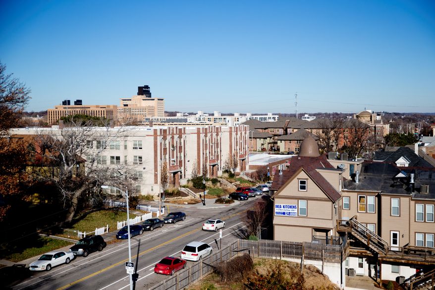 ADVANCE FOR USE SATURDAY, APRIL 16 - This photo taken Dec. 7, 2015, shows the view of the Park Avenue neighborhood from the roof of the Bristol Apartments in Omaha, Neb. inCOMMON, a community development organization, has purchased the property to maintain affordable rent for low income residents. (Sarah Hoffman/Omaha World-Herald via AP)
