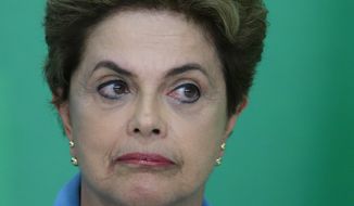 Brazil&#39;s President Dilma Rousseff reacts during a press conference where she spoke about her impeachment process, at Planalto Presidential Palace, in Brasilia, Monday, April 18, 2016. (AP Photo/Eraldo Peres)