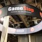 This Aug. 28, 2013, file photo shows signage at GameStop Vegas 2013, in Las Vegas. (Photo by Al Powers/Invision/AP, File)