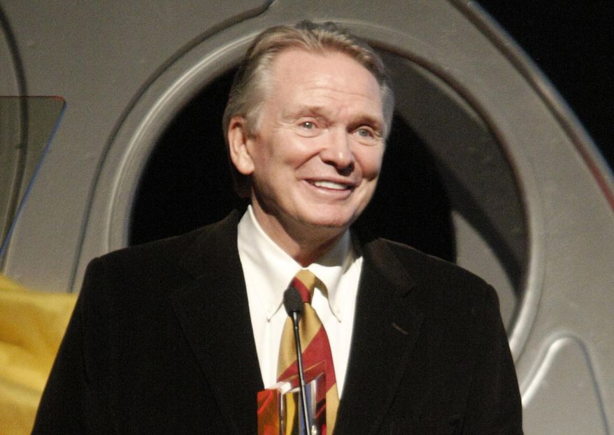 FILE - In this Oct. 12, 2008 file photo, fashion designer Bob Mackie receives an award at the Hollywood Life 5th Annual Hollywood Style Awards in Los Angeles. Mackie, who is famous for his sparkling, imaginative costume designs, will receive the Designer of Excellence Award by the Chicago History Museum's Costume Council on Tuesday, April 19, 2016. (AP Photo/Dan Steinberg, File)