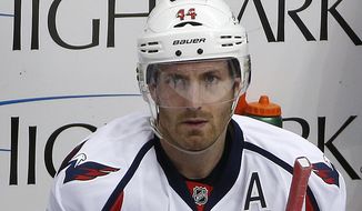 Washington Capitals defenseman Brooks Orpik (44) sits on the bench during an NHL hockey game against the Pittsburgh Penguins in Pittsburgh, Sunday, March 20, 2016. (AP Photo/Gene J. Puskar)