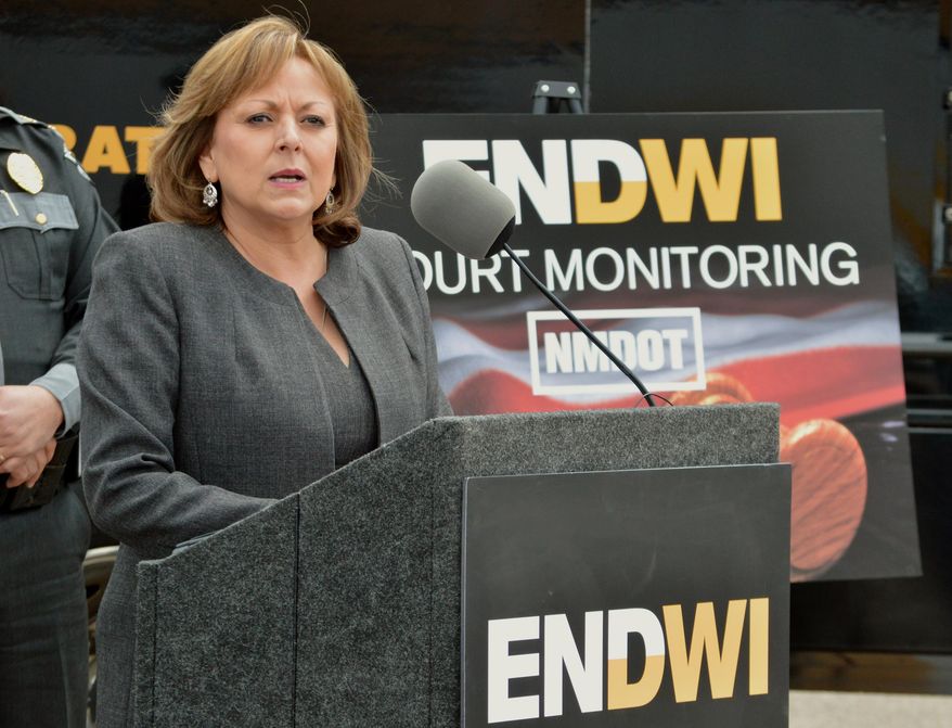 New Mexico Gov. Susana Martinez talks on a new program that will send monitors to courtrooms to watch how judges rule on cases involving suspects with multiple drunken driving convictions, during a news conference in Albuquerque, N.M., Tuesday, April 19, 2016. (AP Photo/Russell Contreras)