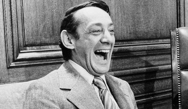 This file photo from April 1977 shows San Francisco Supervisor Harvey Milk in the mayor&#x27;s office during the signing of the city&#x27;s gay rights bill in San Francisco. (AP Photo/File)