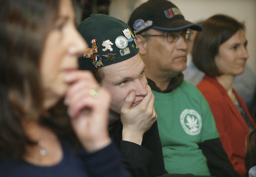 A crowd listens to speakers at a public hearing Tuesday, April 19, 2016, in Augusta, Maine. Speakers describe how marijuana helped them recover from their addiction to opioid drugs and illegal narcotics like heroin. More than 60 people attended the hearing held by the state Department of Health and Human Services. (AP Photo/Tom Bell)