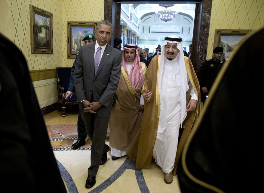 President Barack Obama and Saudi Arabia's King Salman walk together to a meeting at Erga Palace in Riyadh, Saudi Arabia, Wednesday, April 20, 2016. The President begins a six day trip to strategize with his counterparts in Saudi Arabia, England and Germany on a broad range of issues with efforts to rein in the Islamic State group being the common denominator in all three stops. (AP Photo/Carolyn Kaster)