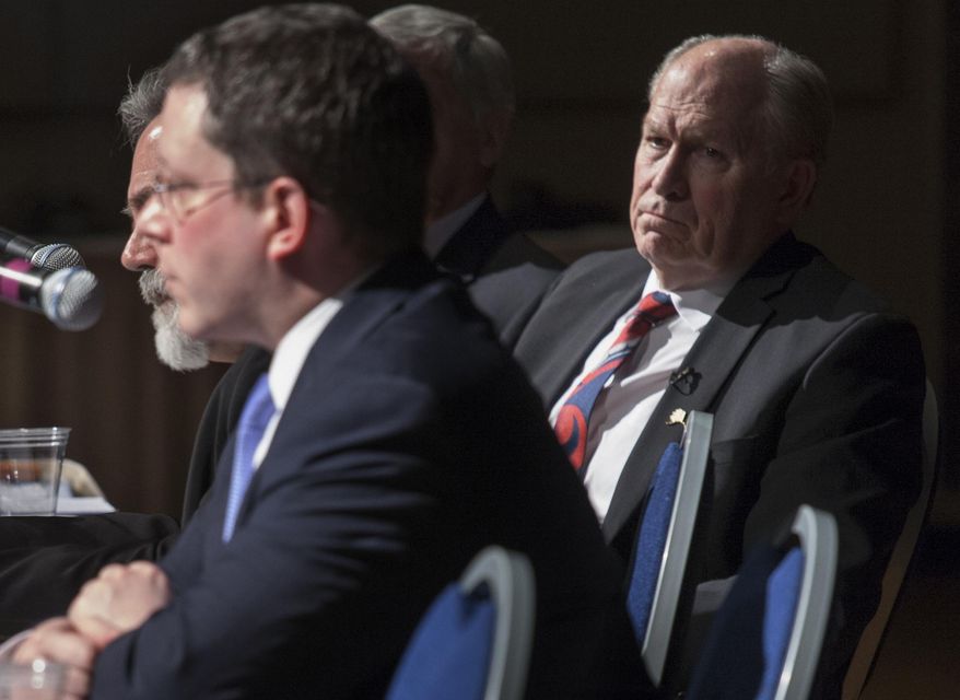 Alaska Gov. Bill Walker listens to his revenue commissioner talk about the state's $4 billion budget deficit during a town hall-style meeting between the administration and lawmakers on Wednesday, April 20, 2016, in Juneau, Alaska. (AP Photo/Rashah McChesney)