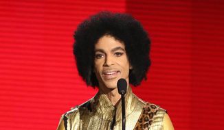 In this Nov. 22, 2015, file photo, Prince presents the award for favorite album - soul/R&amp;B at the American Music Awards in Los Angeles. Authorities are investigating a death at Paisley Park, where pop superstar Prince has his recording studios. Jason Kamerud, Carver County chief sheriff&#39;s deputy, tells the Minneapolis Star Tribune that the investigation began on Thursday morning, April 21, 2016. (Photo by Matt Sayles/Invision/AP, File)