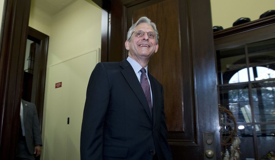 Judge Merrick Garland, President Barack Obama&#x27;s choice to replace the late Justice Antonin Scalia on the Supreme Court, arrives to the office of Sen. Tim Kaine, D-Va., for a private meeting at Capitol Hill in Washington, Thursday, April 21, 2016. ( AP Photo/Jose Luis Magana)