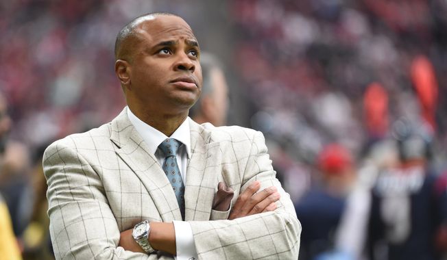 FILE - In this Jan. 2, 2016, file photo, Houston Texans general manager Rick Smith watches during the first half of an NFL football game in Houston.   The Texans have the 22nd pick in the first round in next week&#x27;s NFL draft in Chicago.(AP Photo/Eric Christian Smith) **FILE**