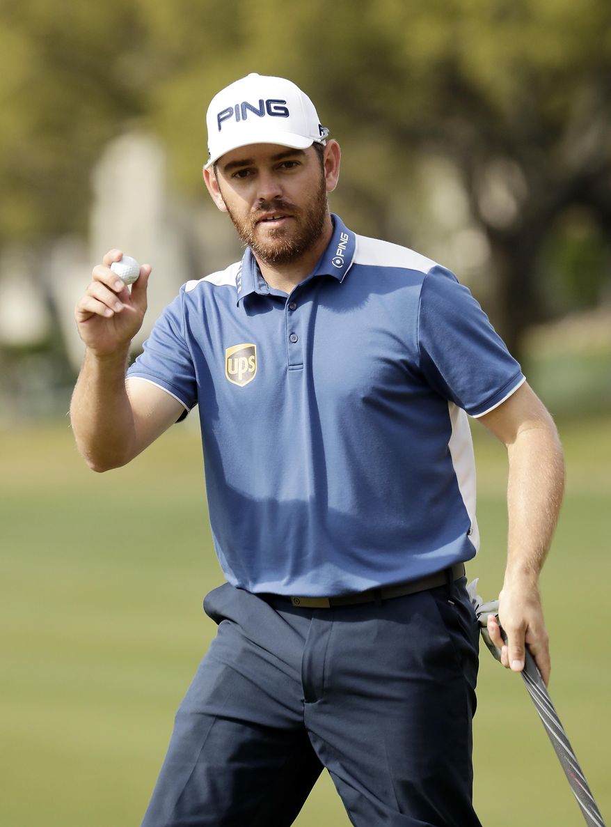 FILE - In this March 27,2016, file photo, Louis Oosthuizen, of South Africa, acknowledges the crowd after sinking a putt on the fifth green during semifinal round play against Rafa Cabrera Bello of Spain at the Dell Match Play Championship golf tournament at Austin County Club in Austin, Texas. Oosthuizen said Thursday, April 21, 2016, that he won't be taking part in golf's return to the Olympics this year, the third major champion to withdraw in the last week as the deadline nears to confirm participation. (AP Photo/Charlie Riedel, File)
