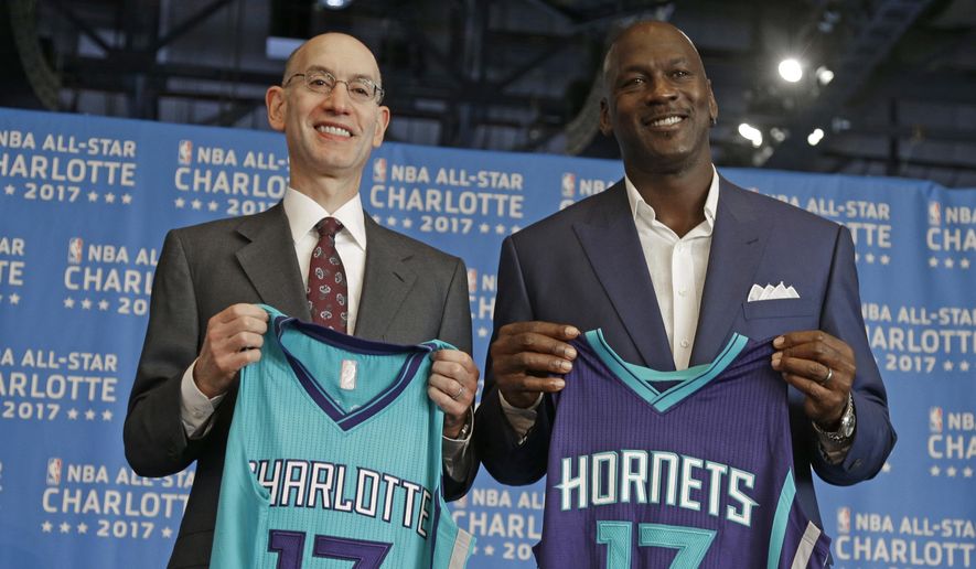 FILE - In this June 23, 2015, file photo, NBA commissioner Adam Silver, left, and Charlotte Hornets owner Michael Jordan, right, pose for a photo during a news conference to announce Charlotte, N.C., as the site of the 2017 NBA All-Star basketball game. Silver said Thursday, April 21, 2016,  he believes the league has made it &amp;quot;crystal clear&amp;quot; that a change in a North Carolina law that limits anti-discrimination protections for lesbian, gay and transgender people is necessary to stage the 2017 All-Star Game in Charlotte, though is resisting setting a deadline for a decision.  (AP Photo/Chuck Burton, File)