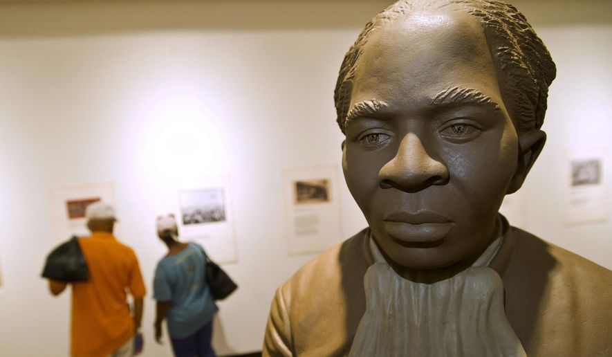 A statue of Harriett Tubman is the centerpiece of the History Gallery at the Tubman Museum, Wednesday, April 20, 2016, in Macon, Ga. (Woody Marshall/The Telegraph via AP) ** FILE **